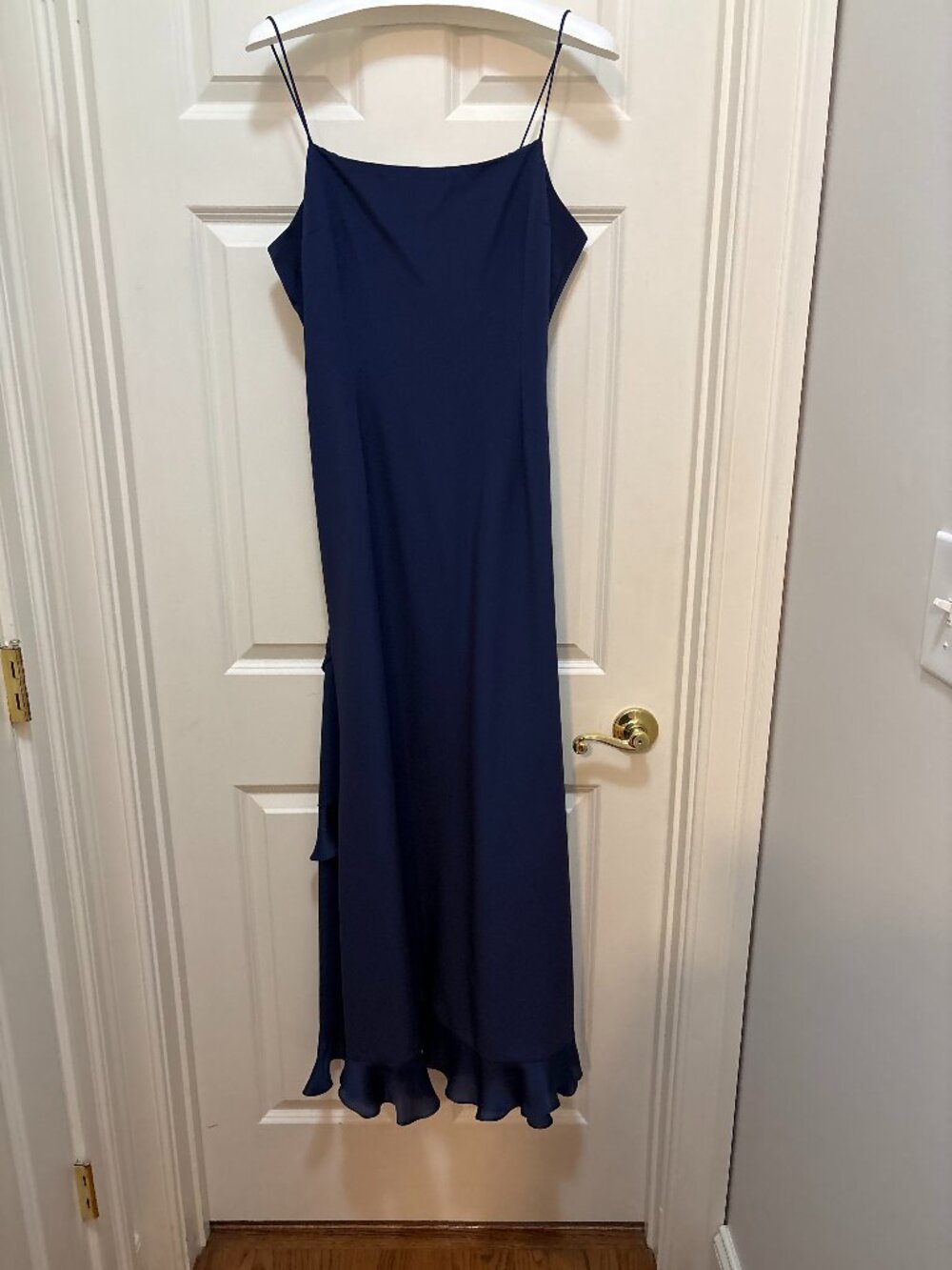 Elegant midnight blue sleeveless gown and matching jacket